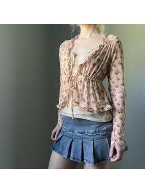 Floral blouse with tie front and ruffles